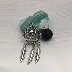 Dreamcatcher Aromatherapy Silver tone Locket.  Lava stone included.